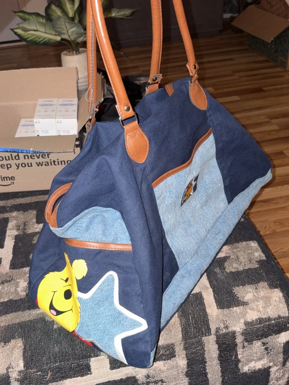 Disney Navy Sling Bag with Winnie the Pooh Print and Red Accent